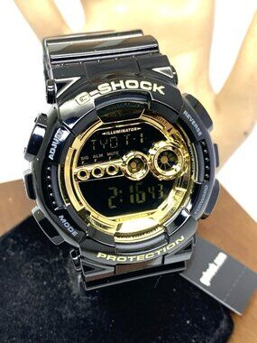 Casio G-Shock Men's Watch GD100GB Sport Gold Black Resin Band 50mm Digital 3263